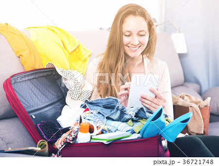 Woman getting ready for holidays Woman getting ready for holidays 36721748