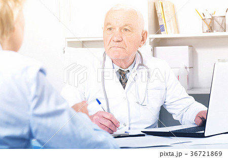 Male doctor with female client 36721869