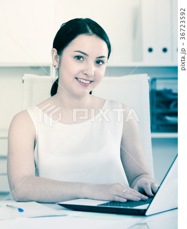 Woman working in office Woman working in office 36723592