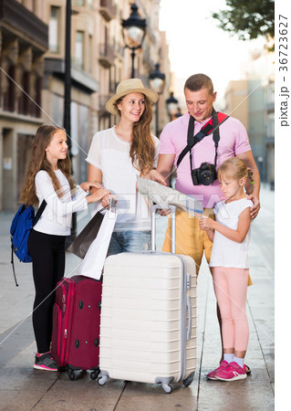 Nice family visiting sights with map 36723627