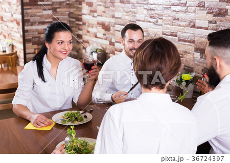 Company of friends in restaurant 36724397