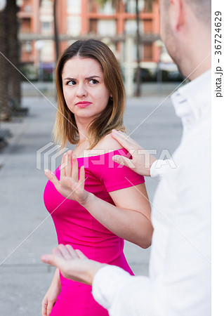 Young female is rejecting stranger man Young female is rejecting stranger man 36724629