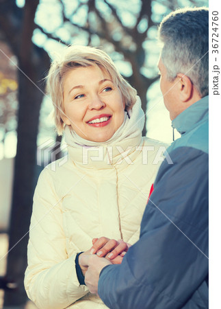 Glad couple heats palms with each other Glad couple heats palms with each other 36724760