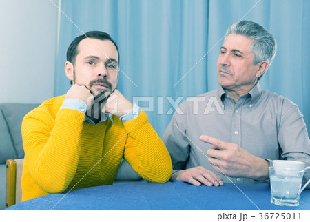 Mature father and son serious talk 36725011