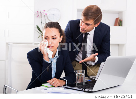angry boss man accusing crying woman to making mistake 36725411
