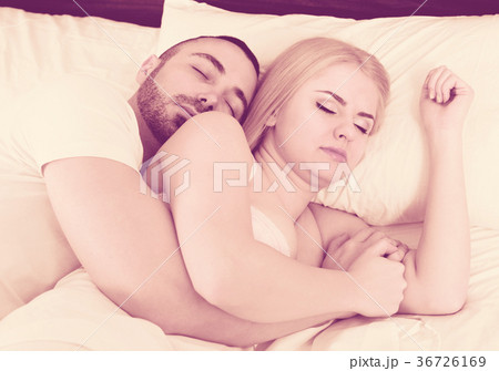 man and blond woman sleeping man and blond woman sleeping 36726169