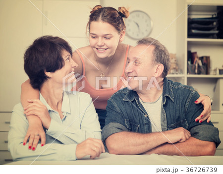 Portrait of happy family at the table 36726739