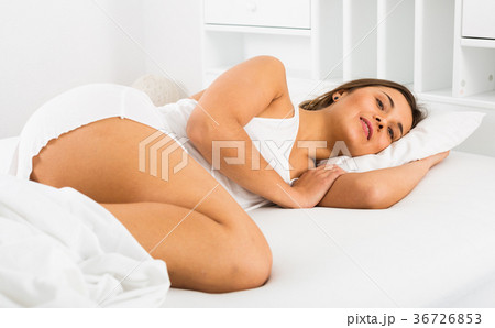Woman sleeping in bed Woman sleeping in bed 36726853