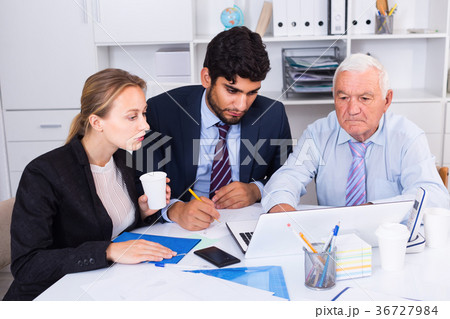 Managers are writing financial reports Managers are writing financial reports 36727984
