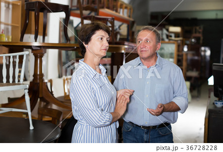 Portrait of glad couple who is shopping Portrait of glad couple who is shopping 36728228