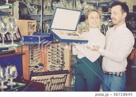 Couple choosing new cutlery 36728645