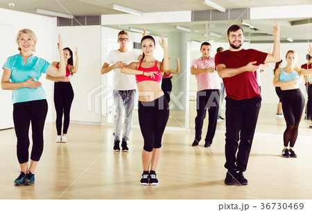 adults of different ages dancing at dance class 36730469