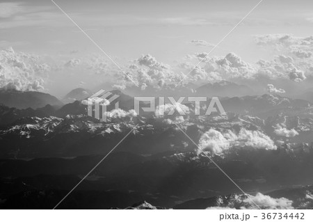 plane wing snow mountain view 36734442