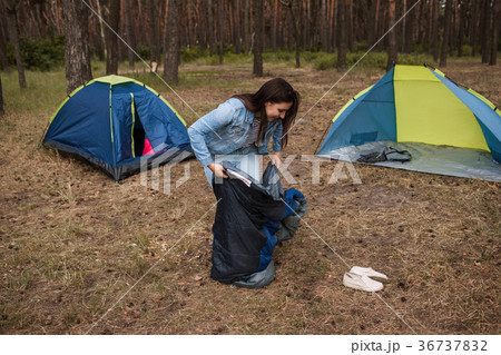 Hiker girl prepare tent nature tourism concept 36737832