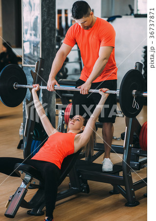 Hard gym workout bodybuilding woman concept. Hard gym workout bodybuilding woman concept. 36737871