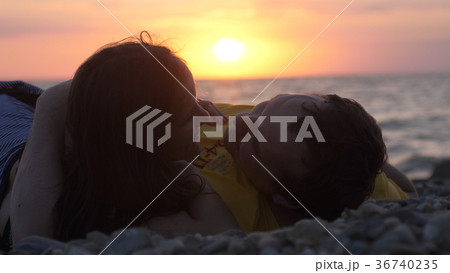 Couple in love romantically lay under the sun 36740235