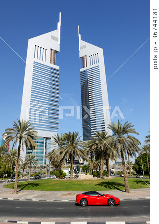 The Emirates Towers and a car, Dubai, UAE 36744181