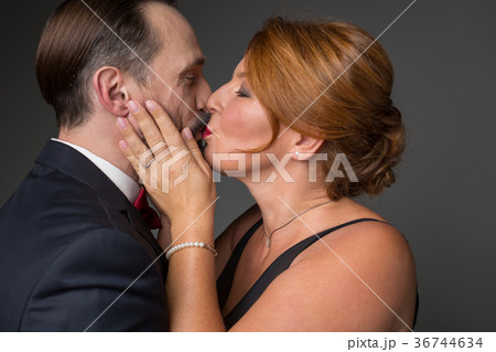 Happy woman expressing affection to man Happy woman expressing affection to man 36744634