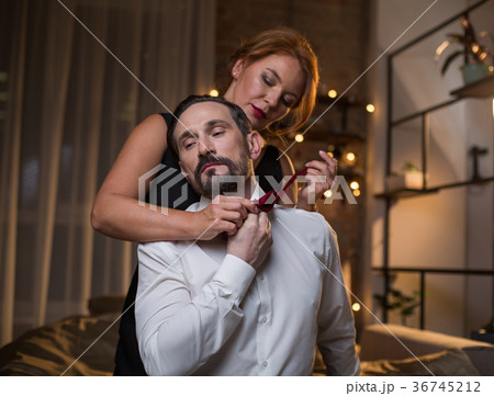 Sensual loving couple taking off clothes in Sensual loving couple taking off clothes in 36745212