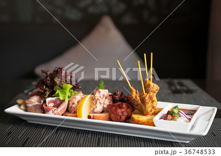 Chicken Satay with peanut sauce Thai cuisine Chicken Satay with peanut sauce Thai cuisine 36748533