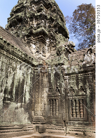 temple with a bas-relief of a dinosaur on a column temple with a bas-relief of a dinosaur on a column 36750353