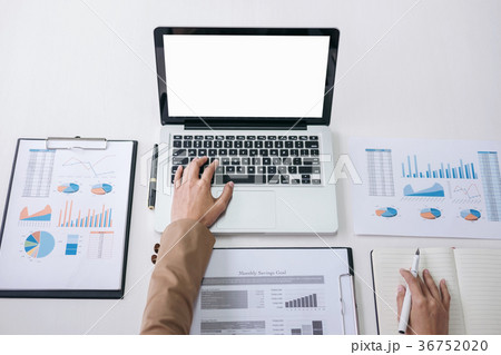 Businesswoman or accountant working Financial investment on lapt 36752020