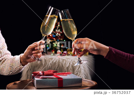 Happy Relaxing and celebrating at party, Two champagne glasses a Happy Relaxing and celebrating at party, Two champagne glasses a 36752037