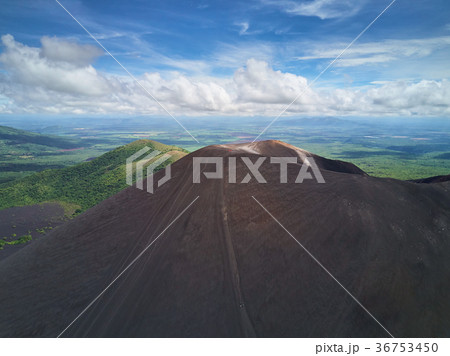 People doing volcano boarding 36753450