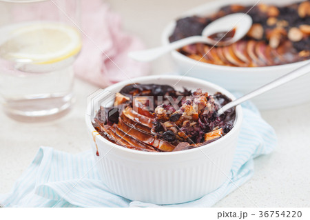 Vegan baked oatmeal crumble with apple, blueberry 36754220