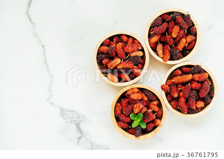 Black mulberry fruit in bowl 36761795