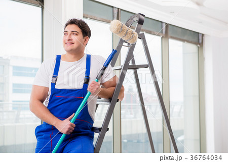 Painter repairman working at construction site 36764034