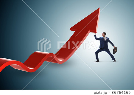 Businessman supporting growtn in economy on chart 36764169