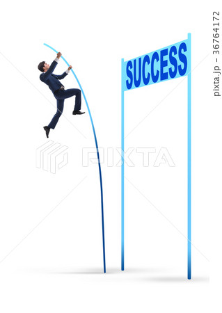Businessman pole vaulting over towards his success 36764172