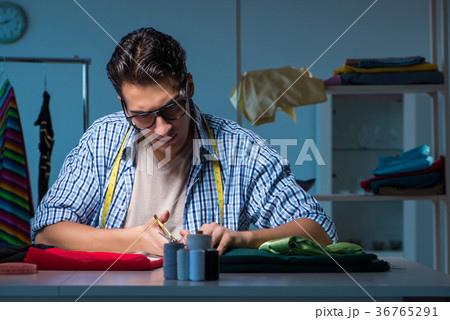 Male tailor working in sewer shop 36765291