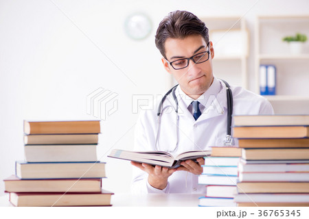 Medical student preparing for university exams 36765345