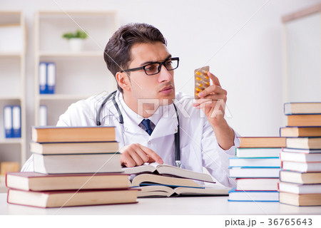 Medical student preparing for university exams 36765643
