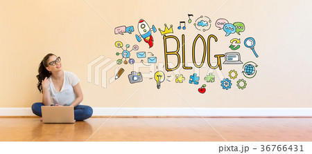 Blog text with young woman using a laptop computer 36766431