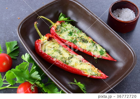 Oven cooked stuffed red paprika  36772720