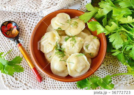 Traditional russian pelmeni with minced meat Traditional russian pelmeni with minced meat 36772723