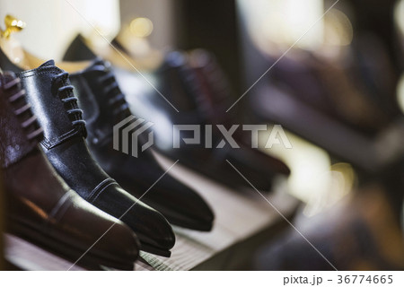 Men shoes in a luxury store in Paris. Men shoes in a luxury store in Paris. 36774665