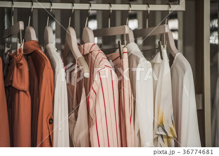 Clothes on hangers in a store in Paris. Clothes on hangers in a store in Paris. 36774681