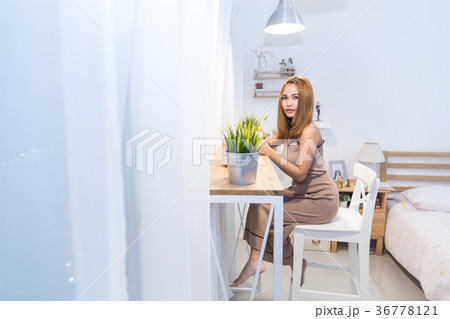 The cute girl drink coffee 36778121