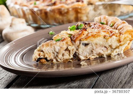 Slice of tart with chicken amd mushrooms Slice of tart with chicken amd mushrooms 36780307