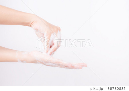 Asian girl hands are washing with soap bubbles Asian girl hands are washing with soap bubbles 36780885