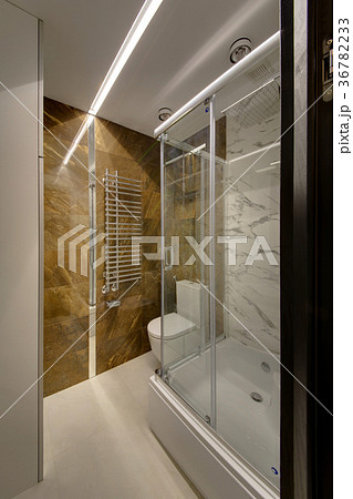 A glass shower cabin with sliding doors A glass shower cabin with sliding doors 36782233