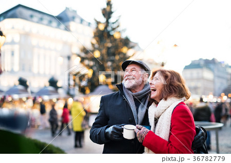 Senior couple on an outdoor Christmas market. 36782779