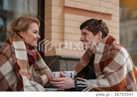 Lovely couple spending time together at cafe 36783047
