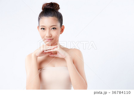 Beautiful woman on isolated White background 36784110