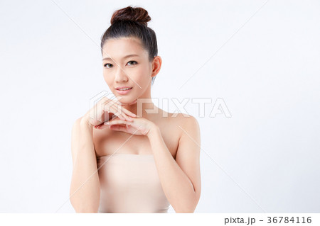 Beautiful woman on isolated White background 36784116