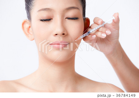 Beautiful woman on isolated White background 36784149